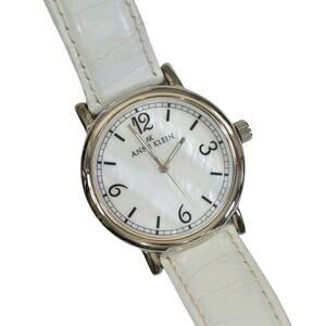 Anne Klein 10/9003 Women’s Watch MOP Dial 36mm Case White Leather Strap